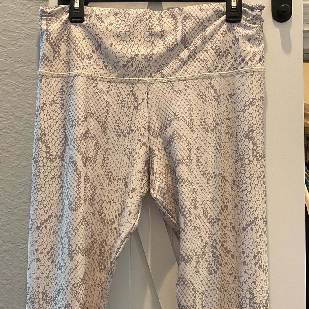 ONZIE multi pattern leggings. Size L